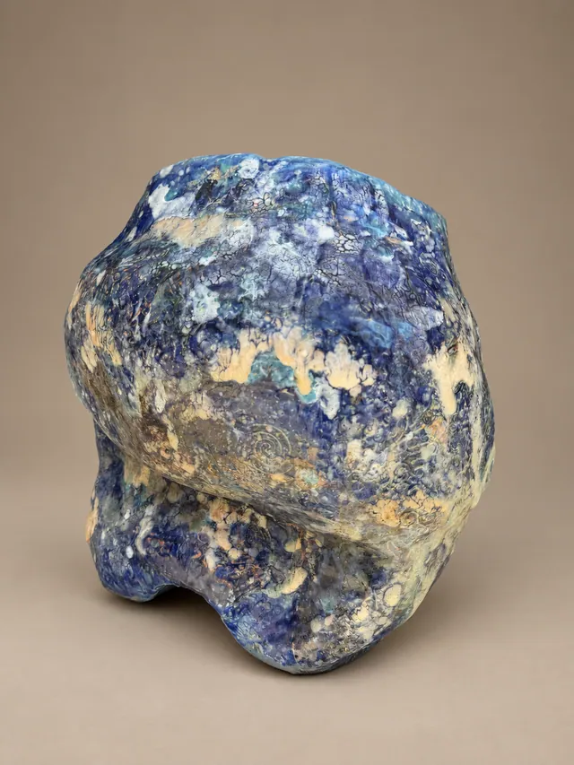 Cobalt blue organic form on small feet
